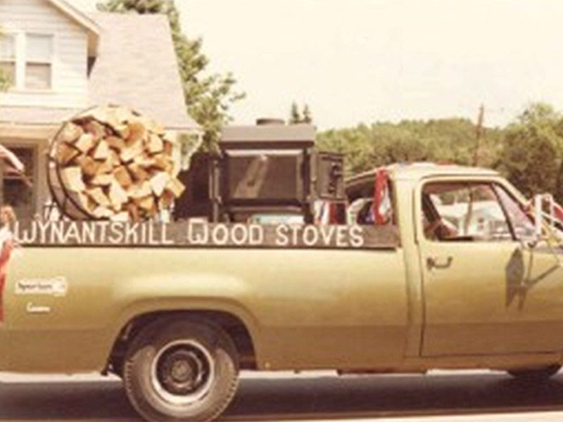 Pickup truck hauling wood