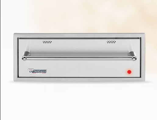A modern, stainless steel return air grille with a small red indicator light mounted on a wall, featuring the "wingates" logo on the bottom right insert.