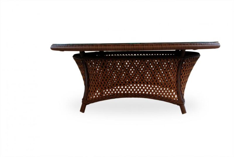 A dark brown wicker coffee table with a woven pattern and a smooth top, featuring a built-in fire pit, isolated on a white background.