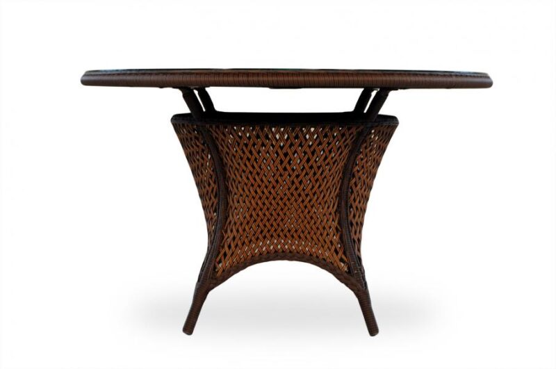 A wooden rattan table with an oval top and a woven lattice base, featuring a built-in fire pit, isolated against a white background.