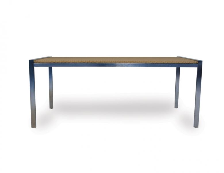 A simple, modern table with a blue metal frame and a rectangular top featuring a geometric patterned surface, isolated against a white background.