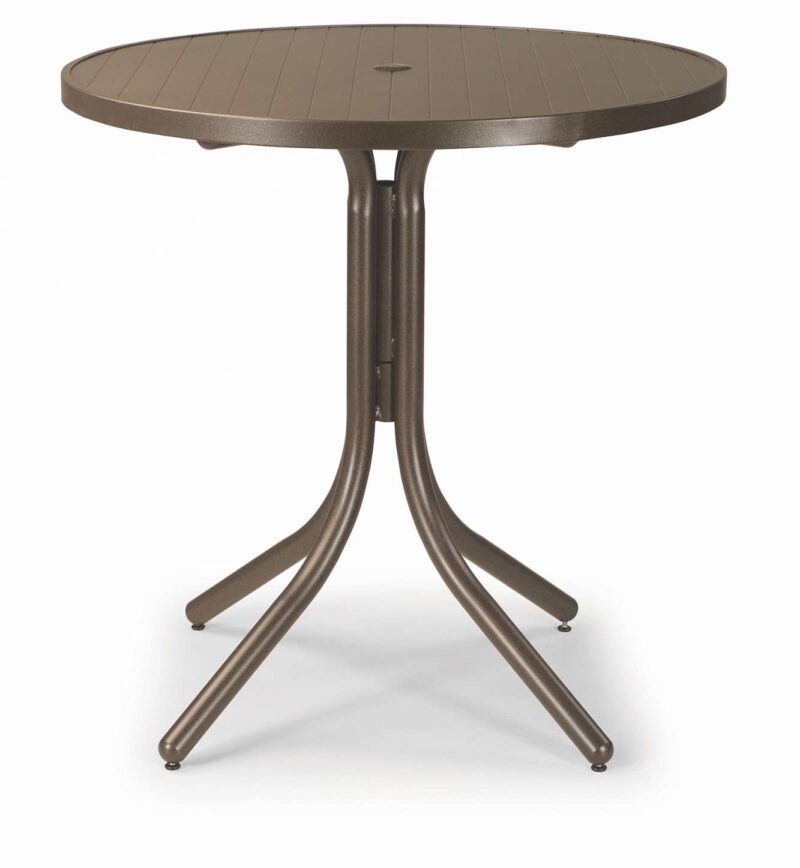 Round outdoor table with a brown top and three splayed legs, positioned near a fire pit on a white background.