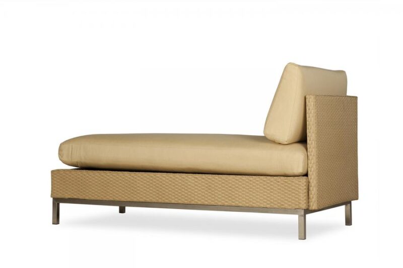 A minimalist chaise lounge with a beige cushion, a woven backrest, and a sleek metal frame on a plain white background featuring a stove insert.