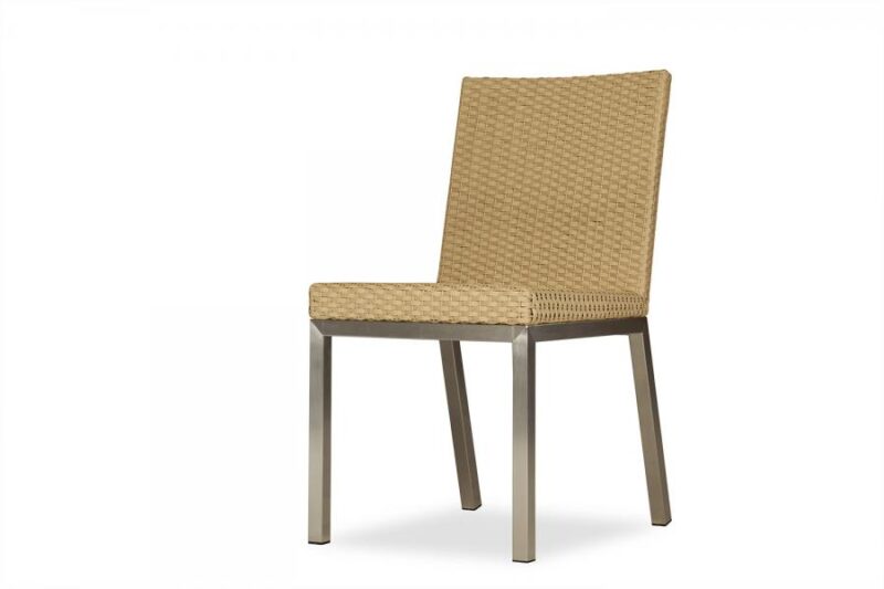 A contemporary chair with a light beige, woven back and seat, supported by a sleek, minimalist silver frame with fireplace insert accents, isolated against a white background.