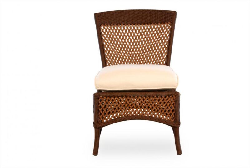 A brown rattan chair with a woven back and base, featuring a beige cushion on the seat, isolated on a white background. An insert of fire-resistant material is included for enhanced durability.