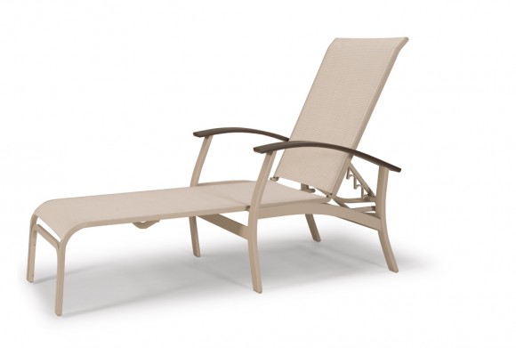 A beige reclining sun lounger with armrests near a fire pit on a white background.