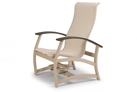 A modern beige reclining garden chair with a mesh back and seat, and curved dark wooden armrests, isolated on a white background near a fire pit.