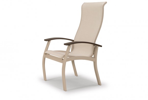 A modern beige outdoor chair with a high back and armrests, designed in a sleek, minimal style, isolated against a white background near a fire pit.