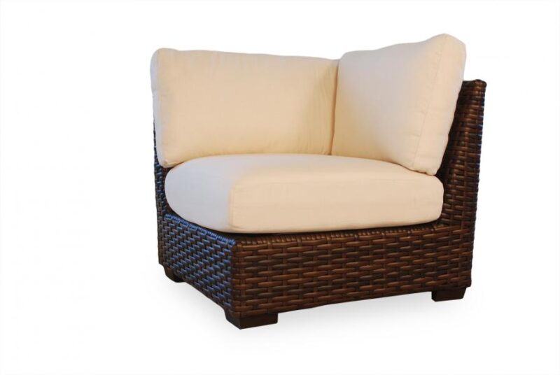 A two-seater wicker outdoor loveseat with plush beige cushions and a fire pit insert on a white background.
