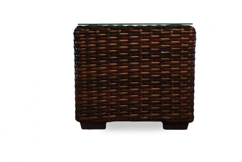 A dark brown, woven rattan laundry hamper with a lid and raised on short legs, inserted into a white background.