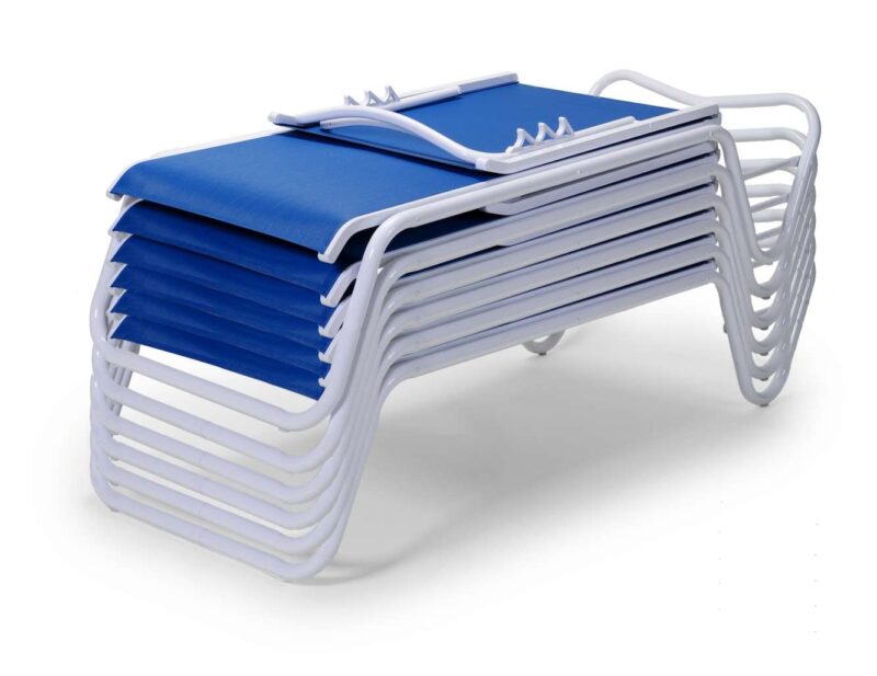 A stack of blue lounge chairs with white frames, neatly stacked and isolated on a white background, near an elegant fire pit.