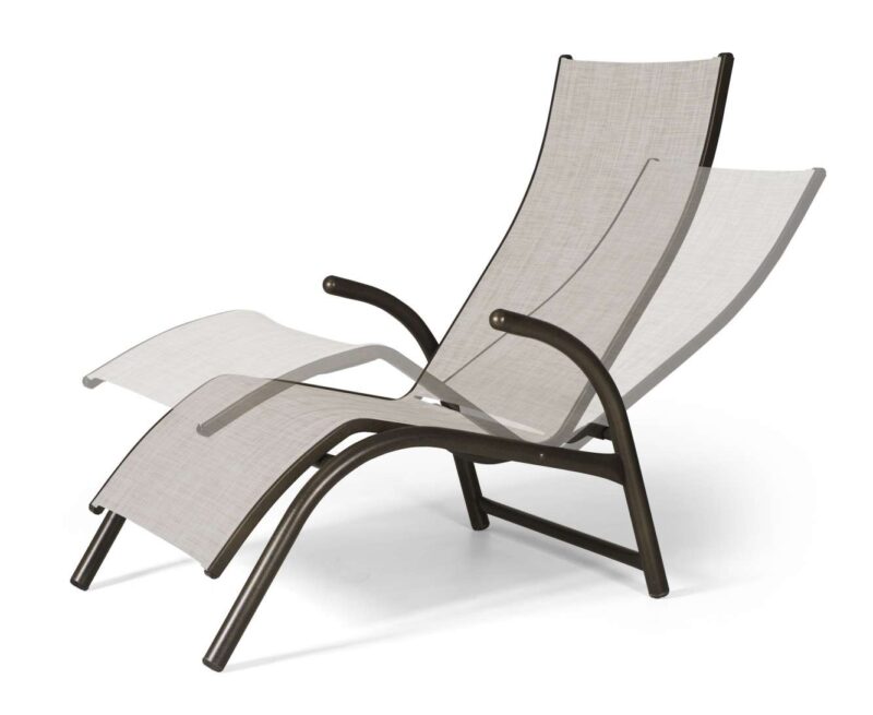 A modern outdoor lounge chair with a matching ottoman, featuring a sleek brown frame and light gray mesh fabric, positioned near a fire pit, isolated on a white background.