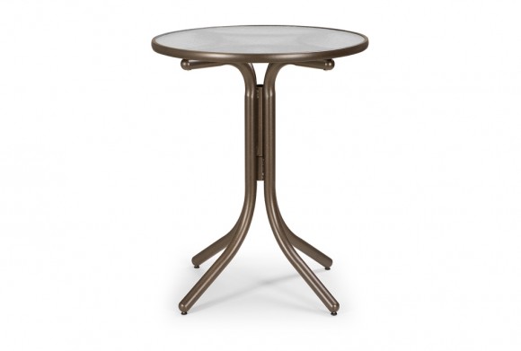 A round, brown metal bistro table with a smooth surface and four elegantly curved legs, isolated on a white background, next to an insert fireplace.
