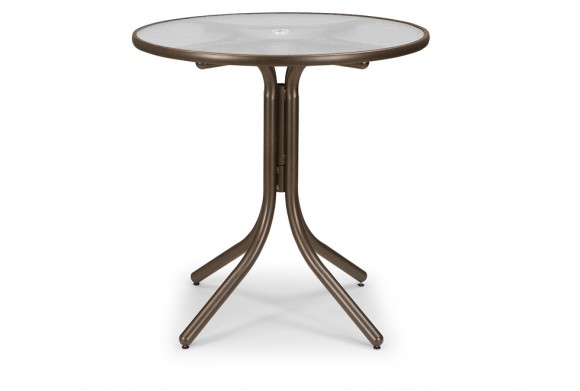A round bistro table featuring a sleek, smoked glass top and a three-legged brown metallic base, isolated on a white background with an adjacent fire pit.