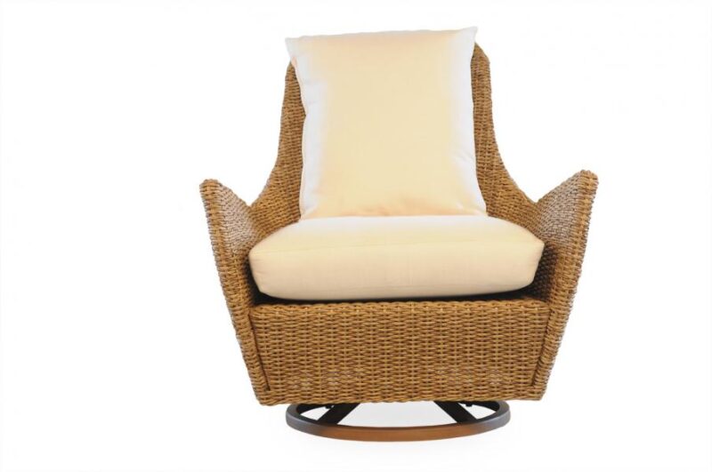 A modern swivel armchair made of woven brown material, featuring plush white cushions on the seat and back, isolated against a white background with a fire pit insert.