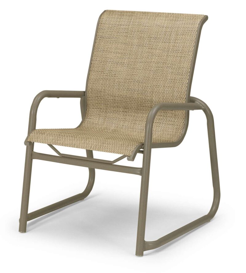 A modern outdoor chair with a light brown mesh back and seat, attached to a sturdy metallic gray frame. The design is sleek with armrests, suitable for patio or garden use near a fire pit