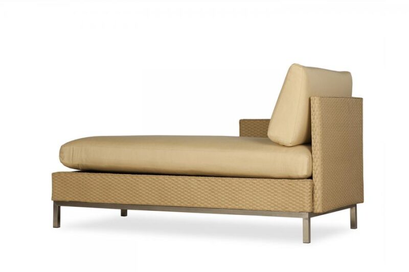A modern beige daybed with a woven texture on the sides and back, featuring a single cushioned armrest on the left and a fireplace insert, set against a white background.