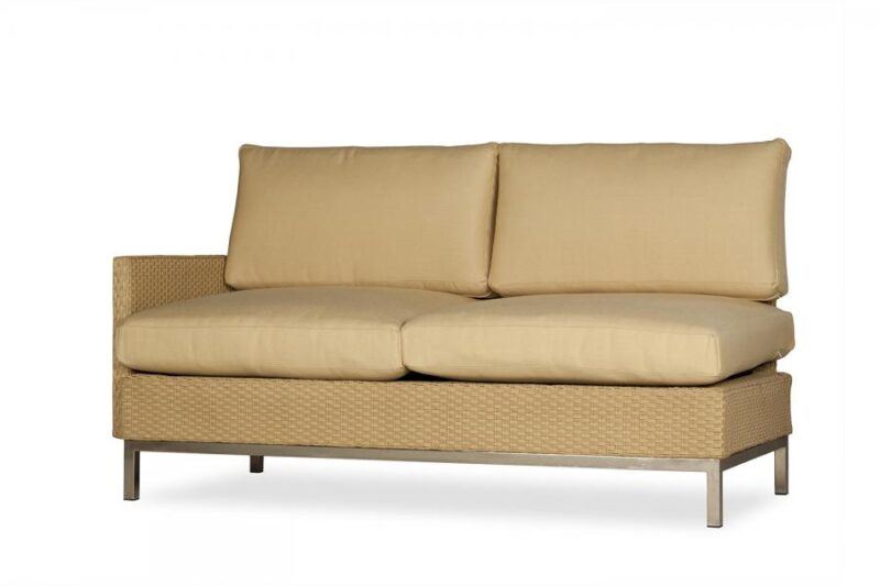A modern beige two-seater sofa with textured upholstery and a minimalist metal frame, isolated on a white background with a fire pit insert.