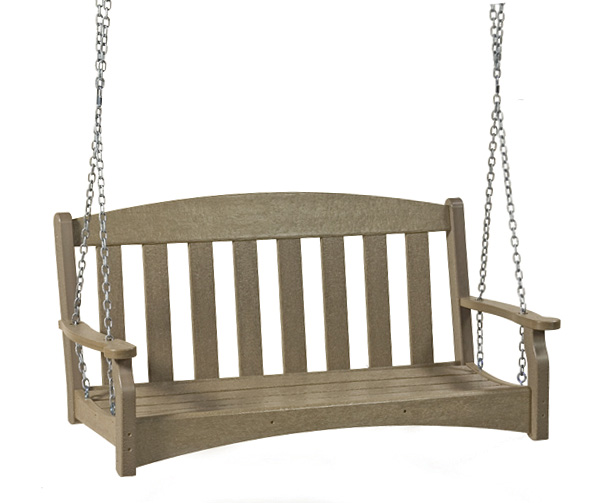 A wooden porch swing suspended by chains, isolated on a white background. The swing features a smooth, curved backrest and flat armrests with an insert.