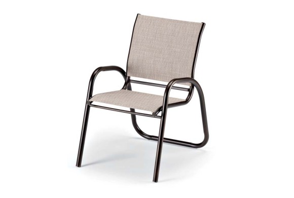 A modern outdoor chair with a sleek black metal frame and beige woven fabric seat and backrest, isolated on a white background near a fire pit.