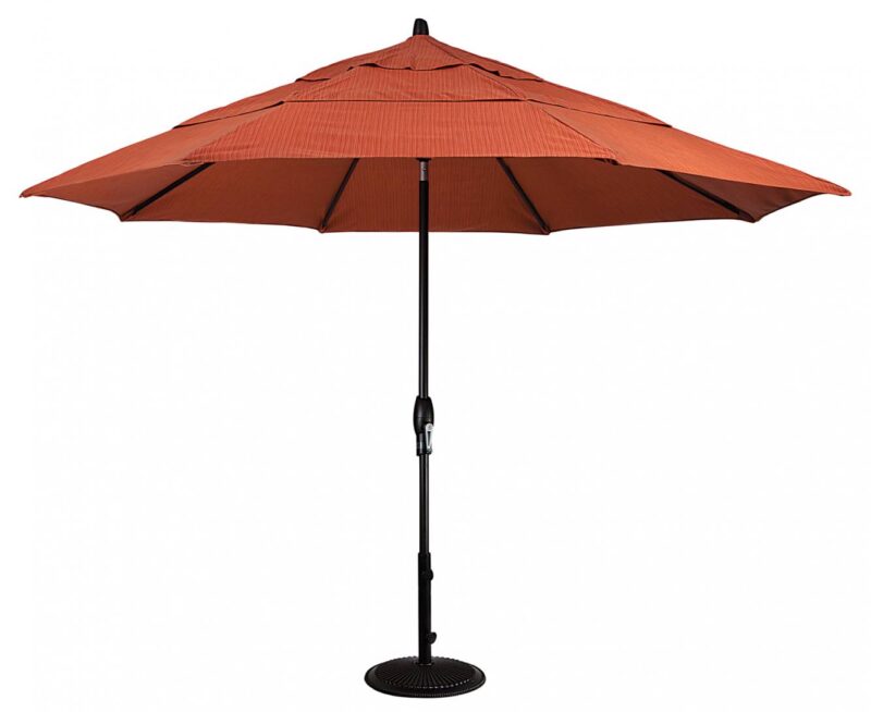 A large orange patio umbrella with a black pole and base, fully opened, isolated on a white background near a pizza oven.
