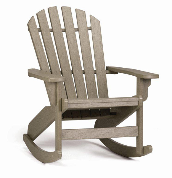 A single weathered gray Adirondack rocking chair, made of slatted wood, with broad armrests, standing isolated against a plain white background.