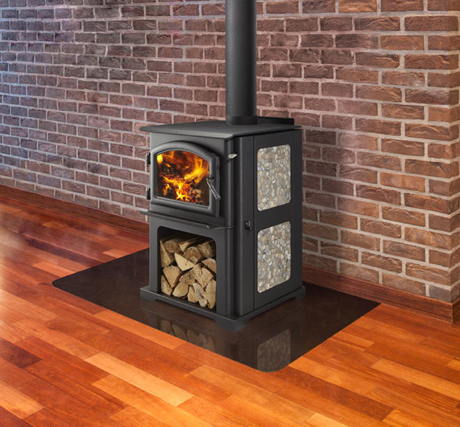 Discovery I wood stove by Quadra-Fire with custom personalized stone side panel against a red brick masonry