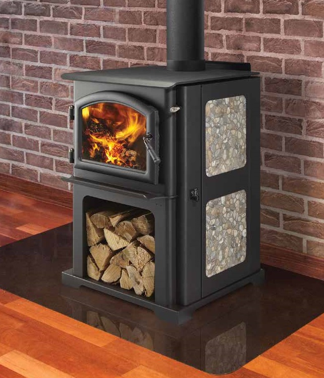 Discovery III wood stove by Quadra-Fire with custom personalized stone side panel against a red brick masonry