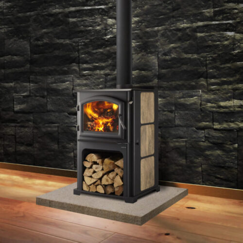 Discovery III wood stove by Quadra-Fire with custom personalized wood side panels against a dark gray masonry