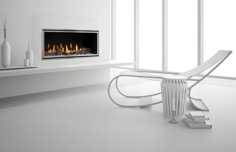 Mezzo 36-inch see-through gas fireplace by Heat & Glo with Loft Forge front against a modern white hearth