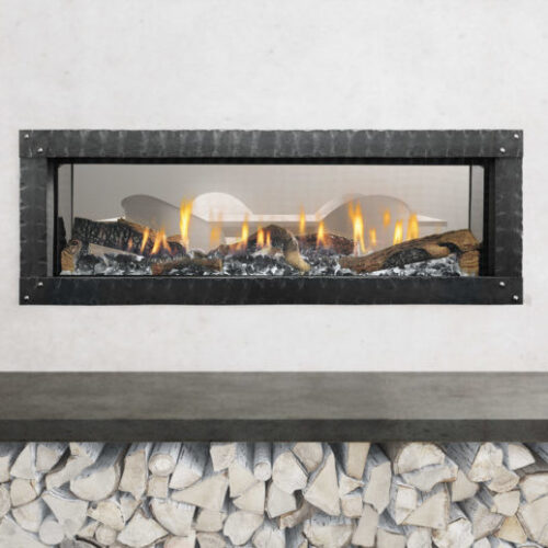 Mezzo 48-inch see-through gas fireplace by Heat & Glo with Loft Forge front against a modern white hearth