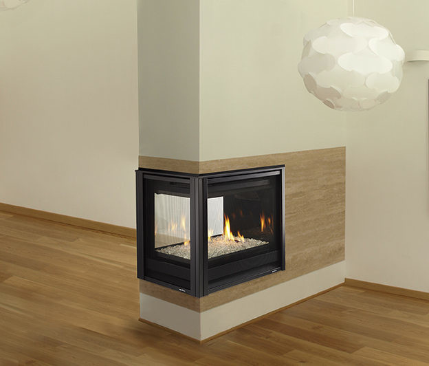 Pier see-through gas fireplace by Heat & Glo in black against a modern wood panel and concrete style hearth