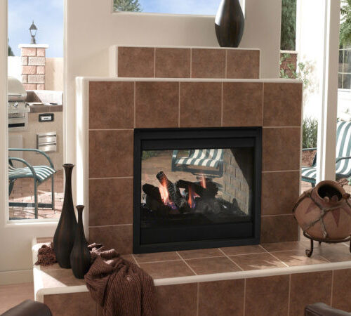 Twilight see-indoor/outdoor gas fireplace by Outdoor Lifestyles with Firescreen front against tan tile hearth
