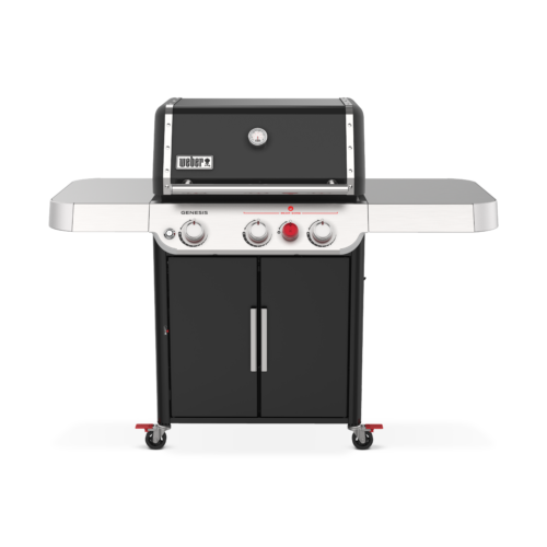 A Weber Genesis SP-E-325s propane grill featuring a stainless steel finish with a closed black cabinet, side shelves, and red control knobs, isolated on a white background.