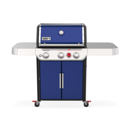 A blue Weber Genesis Deep Ocean Blue SP-E-325s propane grill with silver-colored side tables and control knobs, displayed against a plain background.