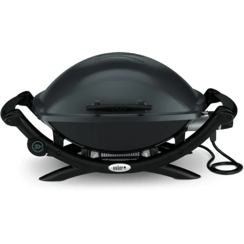 A black Weber Q 2400 portable electric grill with a dome-shaped lid, standing on four legs, with a visible power cord on the right, against a plain white background.