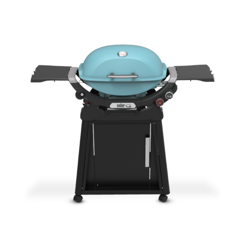 A modern aqua blue gas grill with a lid, side tables, control knobs, and a storage cabinet, set on a black stand with wheels on a plain background.