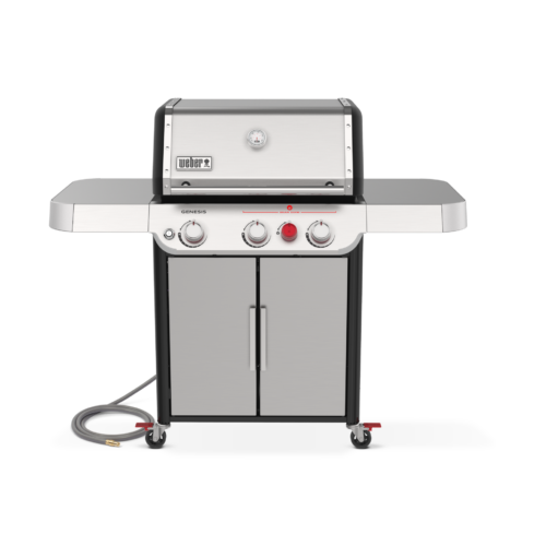 A stainless steel weber genesis ii grill with three burners, side tables, and a closed storage cabinet on wheels, isolated on a white background.